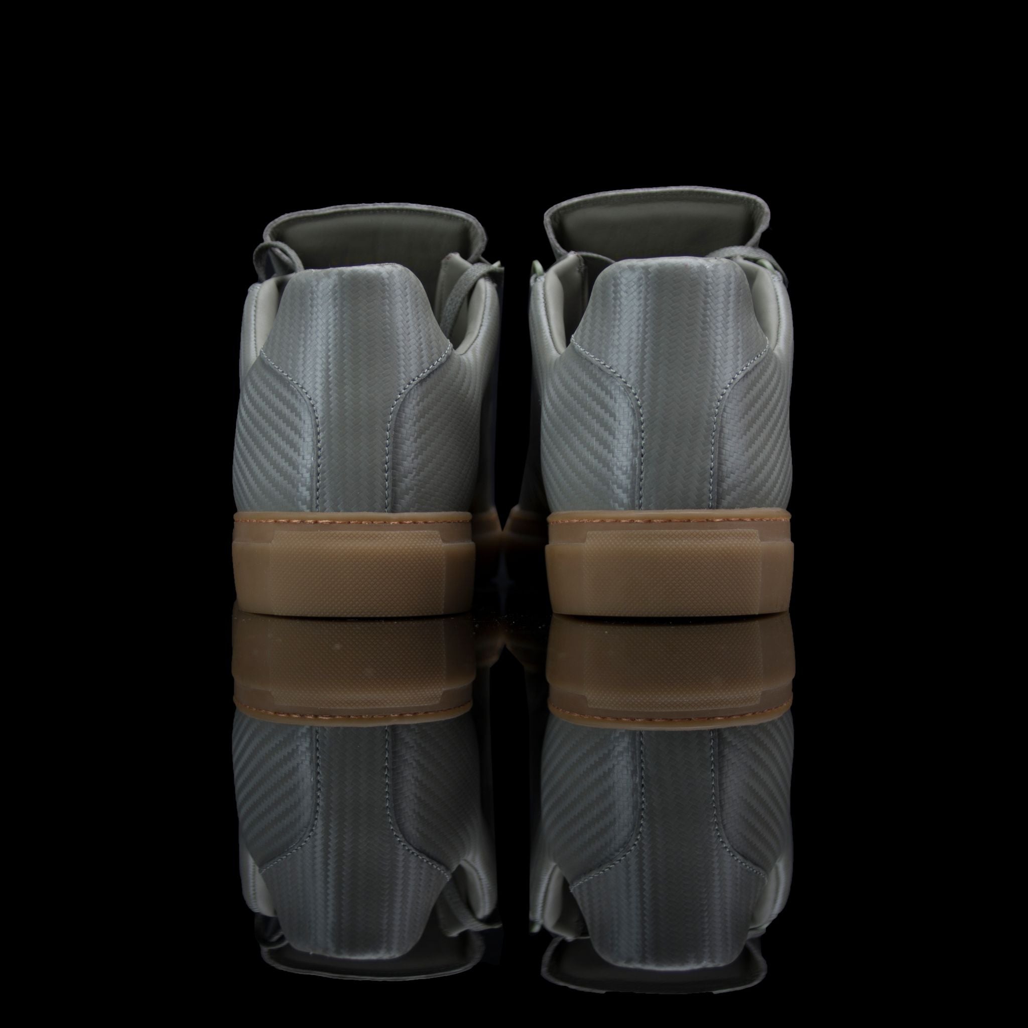 Balenciaga-Arena-Product Code: Colour: Khaki Carbon Fibre - Gum Sole Discontinued Material: Leather, Rubber Sole BALENCIAGA, the Paris based label drops the Arena Low. The casual sneakers are composed in Khaki Carbon Fibre Leather and Gum Sole. Also, the