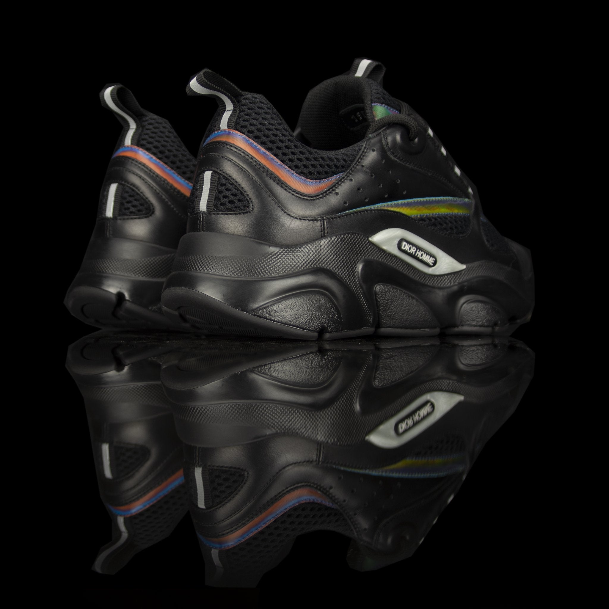 Dior Homme-B22 Sneakers-Black technical knit and black calfskin Black cotton laces Black nylon lining Black nylon pull tab Iridescent Strip, black rubber sole, textured "Dior Homme" logo "Welded" construction Christian Dior launched B22 Sneakers textured