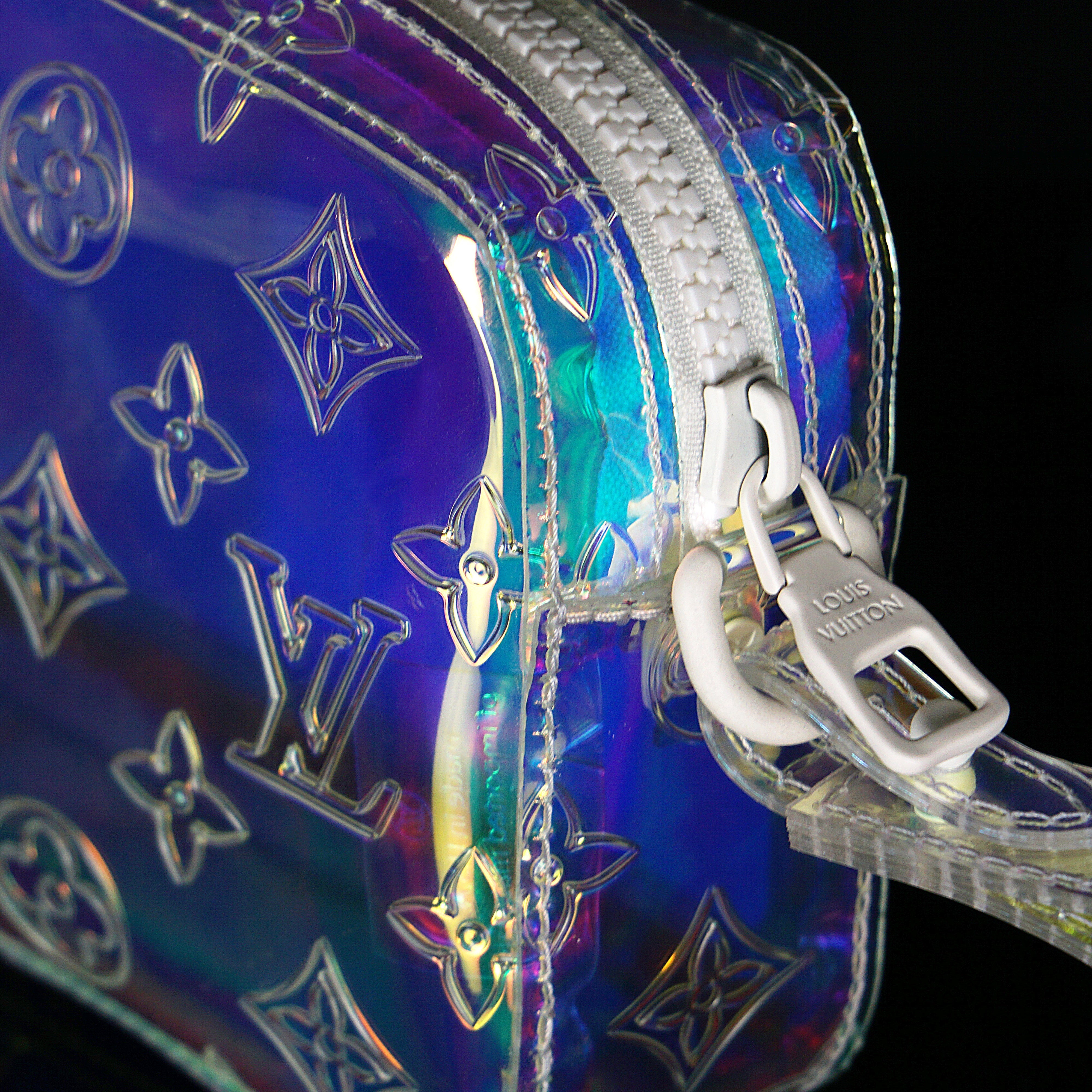 Louis Vuitton-Clutch-23.0 x 11.5 x 4.0 cm (Length x height x width ) L 8.4 x H 4.7 x W 1.9 inches Highly resistant PVC Highly resistant PVC and calf-leather trim Mat-white hardware Zipped compartment Zipped front pocket Removable strap-fabriqe.com
