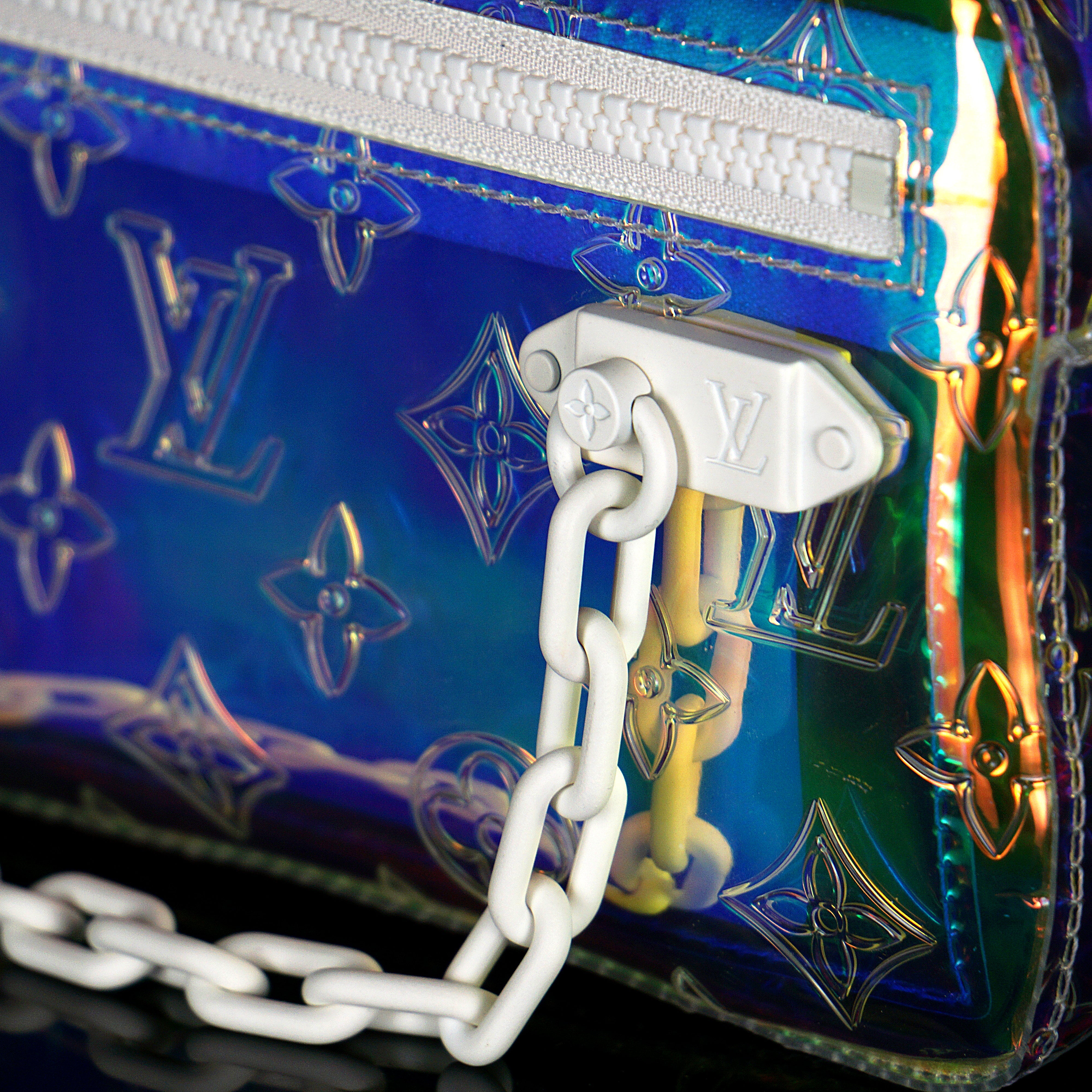 Louis Vuitton-Clutch-23.0 x 11.5 x 4.0 cm (Length x height x width ) L 8.4 x H 4.7 x W 1.9 inches Highly resistant PVC Highly resistant PVC and calf-leather trim Mat-white hardware Zipped compartment Zipped front pocket Removable strap-fabriqe.com
