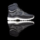Chanel-CC Sneakers-Pre Order Duration (3-5 Working Days) CC Logo on side Black Black White Rubber Sole 2017 Release Limited Stock Chanel CCs crafted in mixed fabric sports CC branding on the side. Nylon at vamp, leather touch at white and suede line finish grabs the spotlight! In the 2017 limited release the sneakers carry Chanel typography on the rubber sole. Pre-order Exclusive!-fabriqe.com