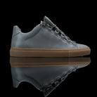 Balenciaga-Arena-Product Code: Colour: Khaki Carbon Fibre - Gum Sole Discontinued Material: Leather, Rubber Sole BALENCIAGA, the Paris based label drops the Arena Low. The casual sneakers are composed in Khaki Carbon Fibre Leather and Gum Sole. Also, the 