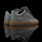 Balenciaga-Arena-Product Code: Colour: Khaki Carbon Fibre - Gum Sole Discontinued Material: Leather, Rubber Sole BALENCIAGA, the Paris based label drops the Arena Low. The casual sneakers are composed in Khaki Carbon Fibre Leather and Gum Sole. Also, the 